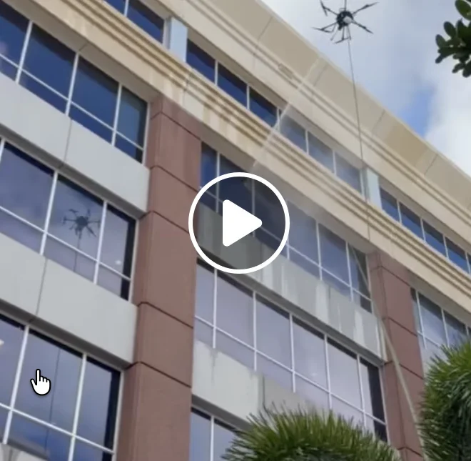 Drone visible near the upper façade in the Doral exterior-maintenance post