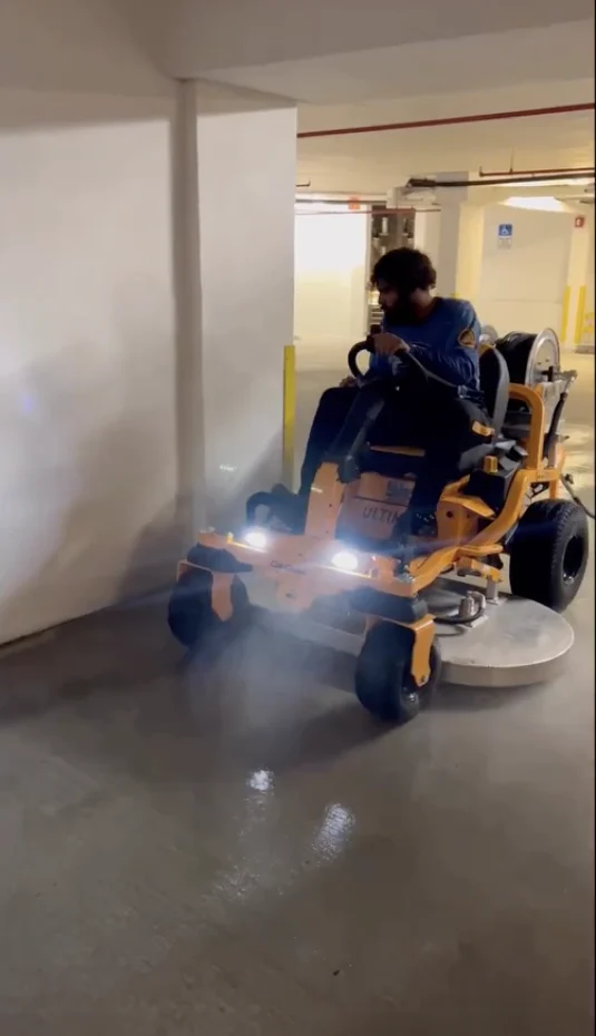 Parking-garage cleaning with custom tools.