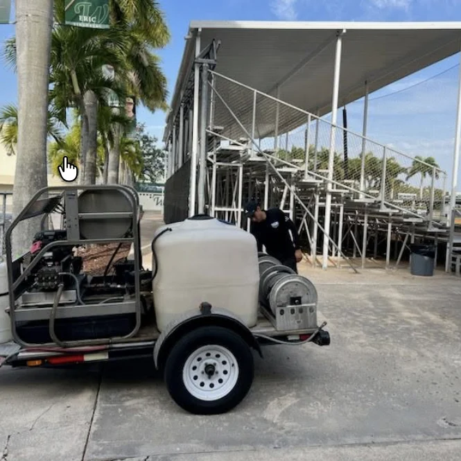 Cleaning equipment positioned alongside the school bleachers