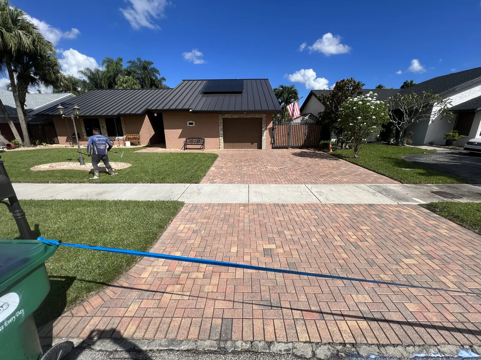 Brick-paver driveway in front of a single-story home, photographed for Pressure Kleen’s residential project collection